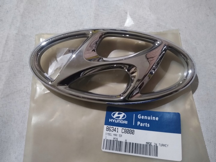Emblema grila radiator Hyundai I20, 10.2014-, montare fata, OEM/OES