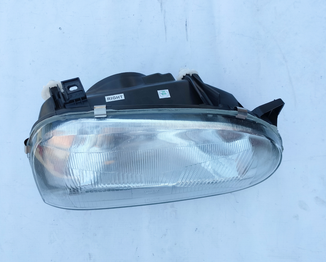 Far VW Golf 3 (Hatchback + Combi+Cabrio) 08.1991-04.1999 AUTOPAL partea Dreapta tip bec H4, conector oval, RESIGILAT